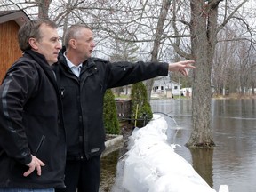 Trent Hills Mayor Hector Macmillan takes Belleville Mayor Neil Ellis on a tour of areas near Campbellford that have been impacted by recent flooding on Friday, April 25, 2014.
Jason Miller/Belleville Intelligencer/QMI Agency