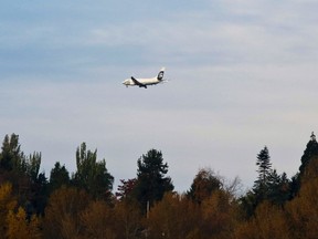 An Alaska Airlines plane approaches Seattle-Tacoma International Airport in SeaTac, Washington in this October 30, 2013 file photo. (REUTERS/Jason Redmond)