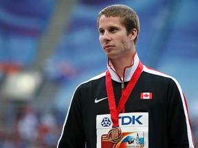 Derek Drouin set the Canadian high jump record of 2.40m at the Drake Relays in Des Moines, Iowa on Friday, April 25, 2014. (Maxim Shemetov/Reuters/Files)
