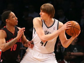 Toronto Raptors guard DeMar DeRozan (10) defends Brooklyn Nets forward Andrei Kirilenko (47) in Game 3 on April 25. (Anthony Gruppuso-USA TODAY Sports)