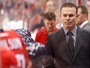 Adam Oates behind the Washington Capitals bench last November. He was fired as head coach on April 26, 2014