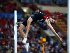 Corunna's Derek Drouin may have ushered in a new ere of competition in the high jump with his 2.40m Canadian record on Friday, April 25. He is pictured above clearing the bar in the men's high jump final during the IAAF World Athletics Championships at the Luzhniki stadium in Moscow August 15, 2013. REUTERS/Kai Pfaffenbach
