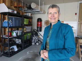 Susan Macaulay of Clarity over Clutter stands in a Winnipeg client's garage she recently gave a makeover on Fri., April 25, 2014. The local spokeswoman for the professional organizers of Canada can help you avoid being a hoarder. Kevin King/Winnipeg Sun/QMI Agency