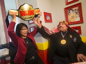 Mayoral candidate Olivia Chow showed up at downtown Toronto sub shop Belly Busters to meet with legendary Hall of Fame wrestler the Iron Sheik Saturday April 26, 2014. Jack Boland/Toronto Sun/QMI Agency