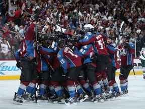The Colorado Avalanche celebrate the game-winning goal by Nathan MacKinnon in Game 5 at the Pepsi Center on April 26, 2014. (Doug Pensinger/Getty Images/AFP)