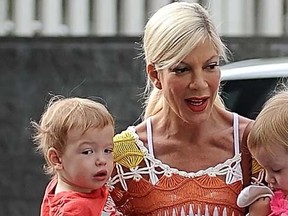 Tori Spelling running errands with her children in Los Angeles, March 22, 2014. (WENN.com)