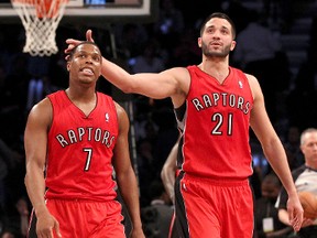 Raptors guard Kyle Lowry (7) and guard Greivis Vasquez react against the Brooklyn Nets during the second half of Game 4 at Barclays Center. The Raptors defeated the Nets 87-79. (AFP)