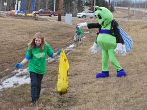 Residents start cleaning up after a long winter.