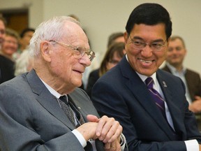 Western University president Amit Chakma laughs with Robert Murray during a ceremony to honour Murray?s late wife Marion who bequeathed $1.6 million to help graduate students in the departments of microbiology and immunology and pathology. (MIKE HENSEN, The London Free Press)