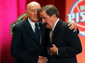 Inductee Herb Magee (R) gets a hug from his presenter, Hall of Fame Coach Jack Ramsay, during the Naismith Memorial Basketball Hall of Fame Class of 2011 Enshrinement Ceremony in Springfield, Massachusetts August 12, 2011.   (REUTERS/Brian Snyder)