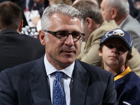 Ron Francis of the Carolina Hurricanes looks on during the 2013 NHL Draft at the Prudential Center on June 30, 2013 in Newark, New Jersey.   (Bruce Bennett/Getty Images/AFP)