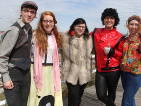 Members of the Youth CHAT (Community Health Action Team) dress in different period costumes as they promote the upcoming Dance of the Century: Tobacco and Alcohol Free Night, Friday. The youth dance's theme is the last 100 years and acknowledges Sarnia's centennial year. Pictured are Tyler Rankin, 17, Laralyn Blondin, 18, Amy Wilkinson, 17, Janelle McLean, 19, and Holly Verbeek, 18. (TYLER KULA, The Observer)