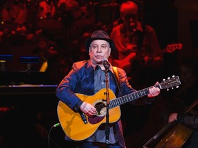 Singer Paul Simon performs during the Rainforest Fund's 25th anniversary benefit concert in New York in this April 17, 2014, file photo.  REUTERS/Lucas Jackson/Files