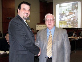 Former Monsignor J. H. O'Neill principal, Ron Curridor, left,  with London District Catholic School Board chair Bill Hall IN 2010. Curridor is facing a disciplinary hearing after being accused of of breaking EQAO rules.   (HUGO RODRIGUES, SUN MEDIA)