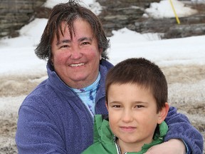 Joanna Nichol Fraser and her son Laverne in Sydenham. Nichol Fraser is looking for provincial funding from the Ministry of Children and Youth Services to help her  son with his disability issues. 
IAN MACALPINE/KINGSTON WHIG-STANDARD/QMI AGENCY