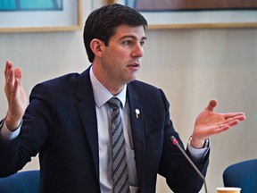 Mayor Don Iveson speaks during a housing roundtable to call for long-term national funding at City Hall in Edmonton, Alta., on Monday, April 28, 2014. Codie McLachlan/Edmonton Sun