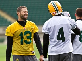 Mike Reilly, shown here at an Eskimos practice last season, says while he has a few little quirks, he likes to laugh in the face of some superstitions — like wearing the No. 13.(Codie McLachlan, Edmonton Sun)