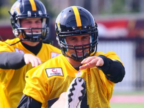The Tiger-Cats’ big off-season signings — free safety Craig Butler and QB Zach Collaros (pictured) — work out Monday during mini-camp in The Hammer. (DAVE ABEL/Toronto Sun)