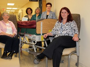 The Alexandra Marine and General Hospital Auxiliary recently purchased three high back patient chairs and an alternating pressure air mattress for use at the hospital. Pictured here with some of that equipment are (left to right) Auxiliary member Mary Lomax, manager of inpatient nursing and dialysis Janet Liefso, Auxliliary member Melitta Wasylciw, manager of inpatient psychiatry and community mental health Jennifer Anderson and chief nursing executive and vice-president patient services Samantha Marsh (DAVE FLAHERTY/GODERICH SIGNAL STAR)