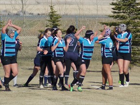 The Pincher Creek Hawks celebrate their first try of the season against the Fort Macleod Flyers. Greg Cowan photo/QMI Agency.