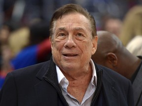 Los Angeles Clippers owner Donald Sterling attends a game against the Los Angeles Lakers at Staples Center in Los Angeles, California in this January 10, 2014 file photo. (Kirby Lee/USA TODAY Sports)