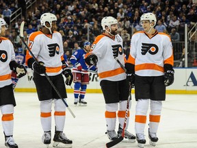 Flyers winger Scott Hartnell (19) talks to centre Vincent Lecavalier (40) during Game 5 of their first round playoff series against the Rangers in New York City on Sunday, April 27, 2014. (John Geliebter/USA TODAY Sports)