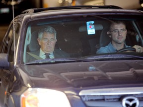 Lawyer Jack King (in passenger seat) leaves federal court in July 2012 after taking the stand at a Canadian Judicial Council inquiry investigating his wife, Judge Lori Douglas. King has died. (JASON HALSTEAD/WINNIPEG SUN FILE PHOTO)