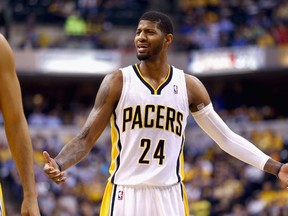 Paul George of the Indiana Pacers disagrees with an officals call in the game 107-97 loss to the Atlanta Hawks in Game 5 of the Eastern Conference Quarterfinals during the 2014 NBA Playoffs at Bankers Life Fieldhouse on April 28, 2014 in Indianapolis, Indiana. (Andy Lyons/Getty Images/AFP)