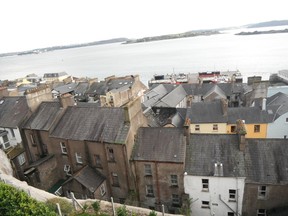 Looking over the slate rooftops of Cobh and the massive Cobh Harbour, from which thousands of Irish families migrated to Canada and beyond. TED RATH/QMI AGENCY