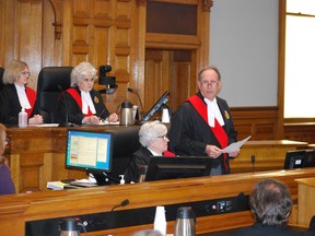 Regional Senior Justice Thomas A. Heeney, right, speaks at the official opening of the courts in Elgin county on Tuesday. Seated from top left are Associate Chief Justice of the Ontario Court of Justice Faith Finnestad, Chief Justice of the Ontario Superior Court of Justice Heather Smith and Regional Senior Justice Kathleen McGowan. Ben Forrest/Times-Journal