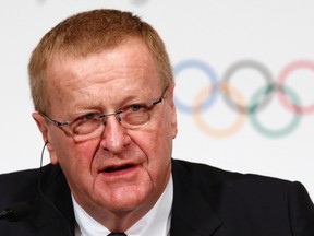 John Coates, International Olympic Committee (IOC) Vice President and Chairman of the Coordination Commission for the Games of the XXXII Olympiad - Tokyo 2020, attends a news conference in Tokyo November 20, 2013. (REUTERS/Issei Kato)