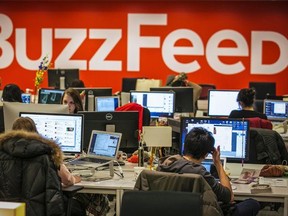 BuzzFeed employees work at the company's headquarters in New York Jan. 9, 2014. REUTERS/Brendan McDermid