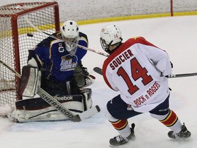 Wellington Dukes forward Mike Soucier beats Kirkland Lake Gold Miners goalie Jeremy Pominville during opening night action at the 2014 Dudley Hewitt Cup tournament Tuesday at Essroc Arena in Wellington. (BRUCE BELL/The Intelligencer)