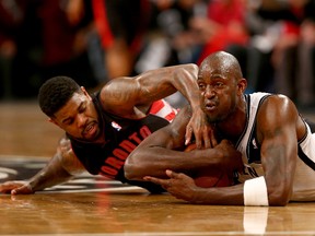 Celtics’ Kevin Garnett (right) grabs the loose ball before Raptors’ Amir Johnson can get at it. Garnett is averaging 21.2 points in Game 5s in his career, while shooting 51.9% from the floor. (AFP)