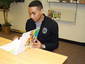 Ben Leeson/The Sudbury Star
St. Charles College student Tyger Louis looks at some course material from the new aboriginal entrepreneurship program being offered as a pilot program at the school this fall.