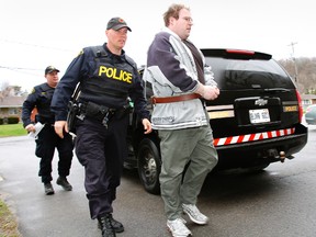 James Beau Jeffery, 30, is escorted inside Picton Courthouse on the last day of his second-degree murder trial before Justice Robert Scott Wednesday morning, April 30, 2014. - Jerome Lessard/The Intelligencer/QMI Agency