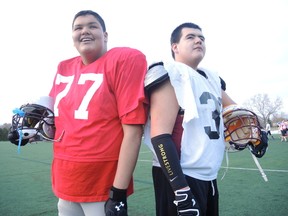 Kyle Gunner (left) and Clayton Saganash are getting a lesson in football and in hope leading into Thursday’s Athletes in Action high school all-star football prospects showcase game in Ottawa. (Tim Baines/Ottawa Sun)