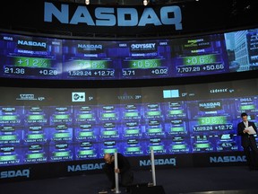 Employees prepare the live studio of the  NASDAQ, in New York, in this March 25, 2009 file photo. (AFP)