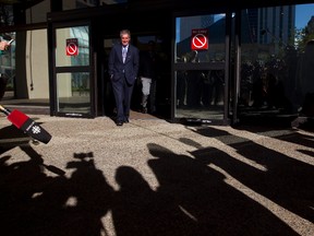 FILE: Omar Khadr's lawyer Dennis Edney walks out to the media outside the courthouse in Edmonton, Alta. on Monday, Sep. 23, 2013.
