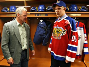 Former NHLer Paul Reinhart and son Griffin Reinhart stand in the Edmonton Oil Kings dressing room at Rexall Place to introduce their future captain after he was taken 3rd overall at the 2009 WHL bantam draft.