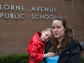 Ellen Husk and daughter Hailey Polfuss, 6, are disappointed that Lorne Avenue elementary school, where Hailey is in senior kindergarten, may close. (DEREK RUTTAN, The London Free Press)