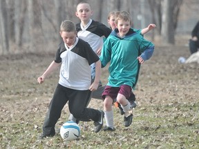Action from the opening night of the Portage Youth Soccer Association Wednesday. (Kevin Hirschfield/THE GRAPHIC)