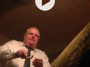 Stills from a video that was offered for sale to the website Gawker.com. The seller told the website that the pipe in Mayor Rob Ford's hand contained crack cocaine. (Photo courtesy Gawker.com)