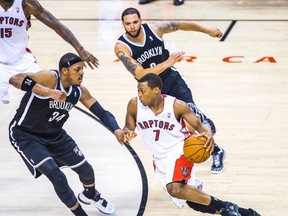 Toronto Raptors' Kyle Lowry and Brooklyn Nets' Paul Pierce during Game 5 on April 30. (Ernest Doroszuk/Toronto Sun/QMI Agency)