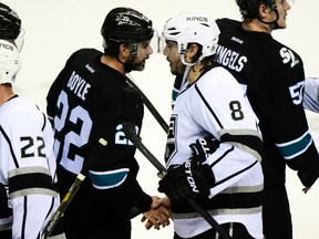 San Jose Sharks defenceman Dan Boyle shakes hands with Los Angeles Kings defenceman Drew Doughty after Game 7 of their Western Conference quarterfinal series at the SAP Center in San Jose, April 30, 2014. (KYLE TERADA/USA Today)