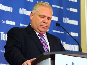 Councillor Doug Ford addresses the media Thursday, the morning after Mayor Rob Ford said he has decided to take a leave of absence. (DAVE ABEL/Toronto Sun)
