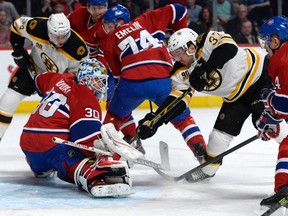 Montreal Canadiens goalie Peter Budaj (30) makes a save on Boston Bruins forward Patrice Bergeron (37) during the first period at the Bell Centre earlier this season. (Eric Bolte-USA TODAY Sports)