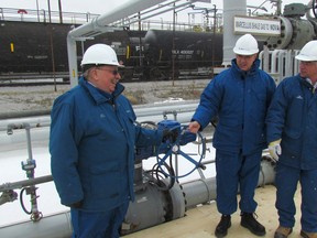 Nova Chemicals celebrated the arrival of natural gas liquids ethane feedstock at its Corunna facility, arriving by pipeline from the Marcellus shale region of the U.S. From left, Sarnia-Lambton MPP Bob Bailey, Nova CEO Randy Woelfel and Tom Thompson, Nova's manufacturing director in Sarnia. Taping in to the lower-priced feedstock has turned around the outlook for the plant located in St. Clair Township. Sanria, Ont., Jan. 16, 2013  PAUL MORDEN/THE OBSERVER/QMI AGENCY