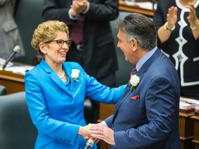 Ontario Premier Kathleen Wynne and Finance Minister Charles Sousa after he announced the provincial budget at Queen's Park in Toronto on Thursday May 1, 2014. Ernest Doroszuk/Toronto Sun/QMI Agency