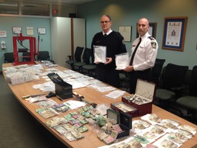 Guelph Deputy-chief Jeff DeRuyter, left, stands with Darryl Longworth, Woodstock's deputy-chief during a press conference announcing the success of Project Vegas, which started August 2013. More than 1.29 kilograms of cocaine worth about $100,000 was seized during the investigation. TARA BOWIE / WOODSTOCK SENTINEL-REVIEW